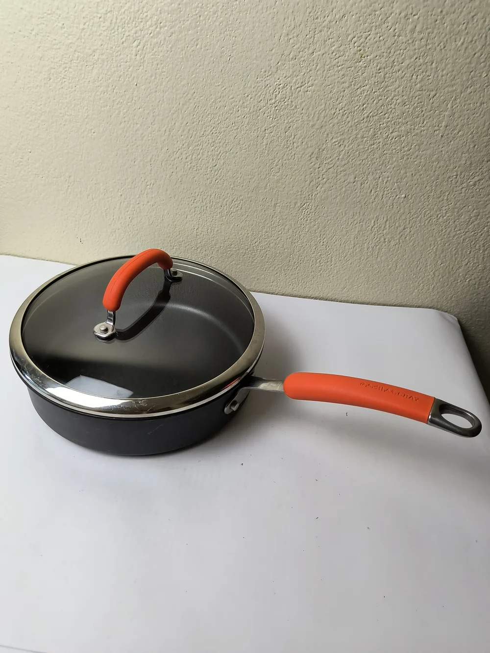 Rachael Ray 3QR/2.8L Black Sauté Pan with Orange Silicone Handle and Lid Grip